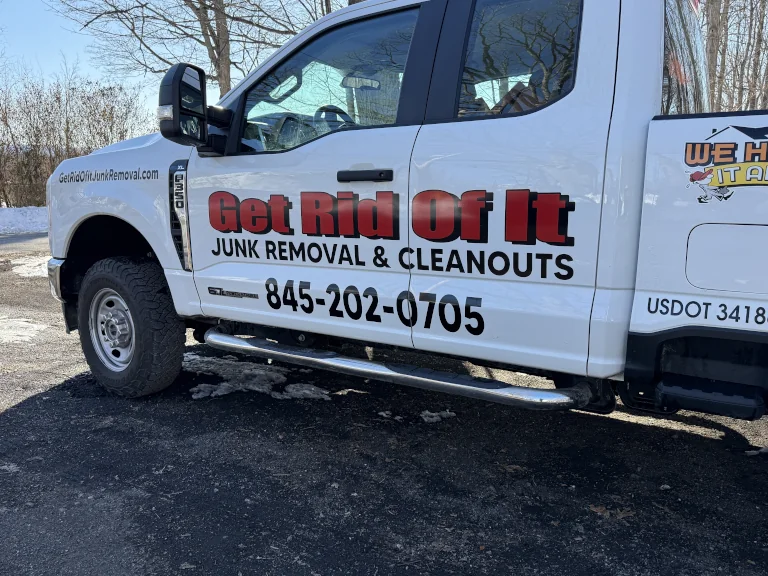 get rid of it sign on side of truck